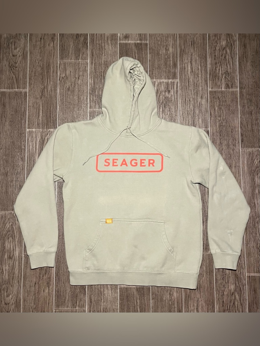 Seager Men’s Pullover Hoodie in Light Sage with Coral Logo